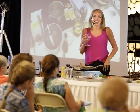 Julie Hartigan hosting a live cooking demo