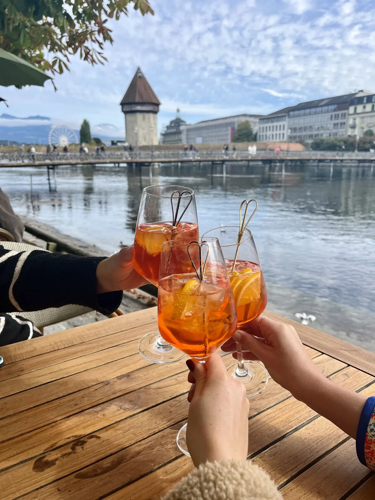 Friends celebrating with spritz
