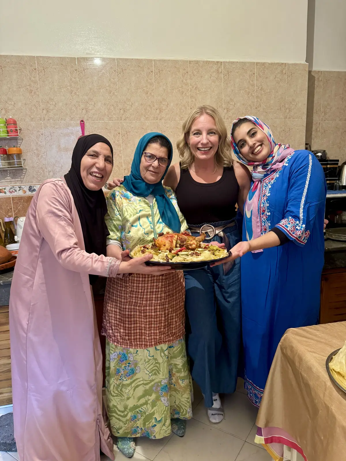 Julie Hartigan with Moroccan women cooking together